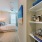 Bedroom hallway with built in shelving